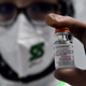 A lab technician from pharma company Saidal showing a vial of the Sinovac vaccine for the novel coronavirus in Constantine, Algeria, in September 2021.